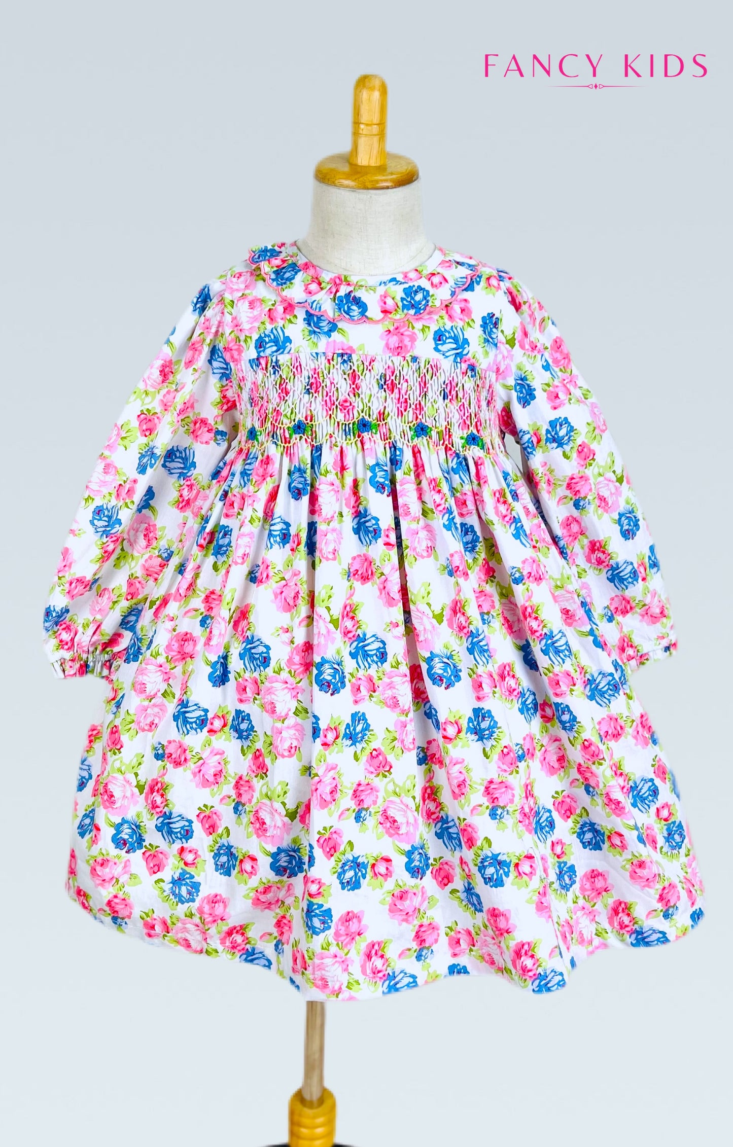 Victoria hand smocked long sleeve pink and blue floral dress