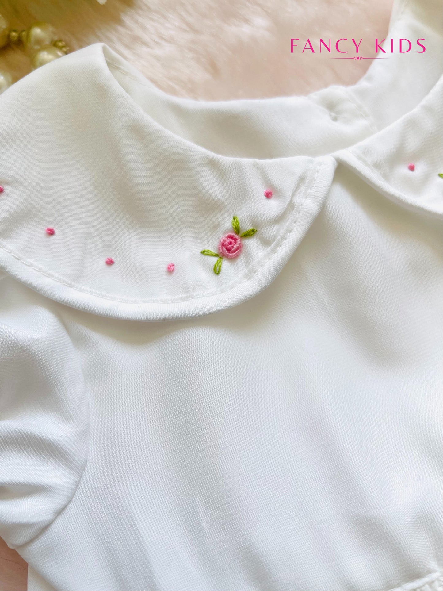 Hand smocked hand embroidered white dress with bead work