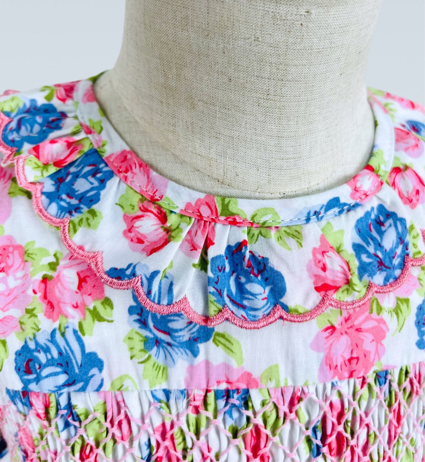 Victoria hand smocked long sleeve pink and blue floral dress