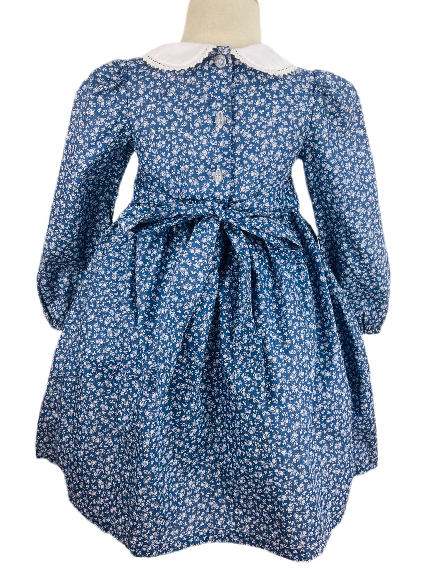 Maya hand smocked long sleeve blue floral winter dress