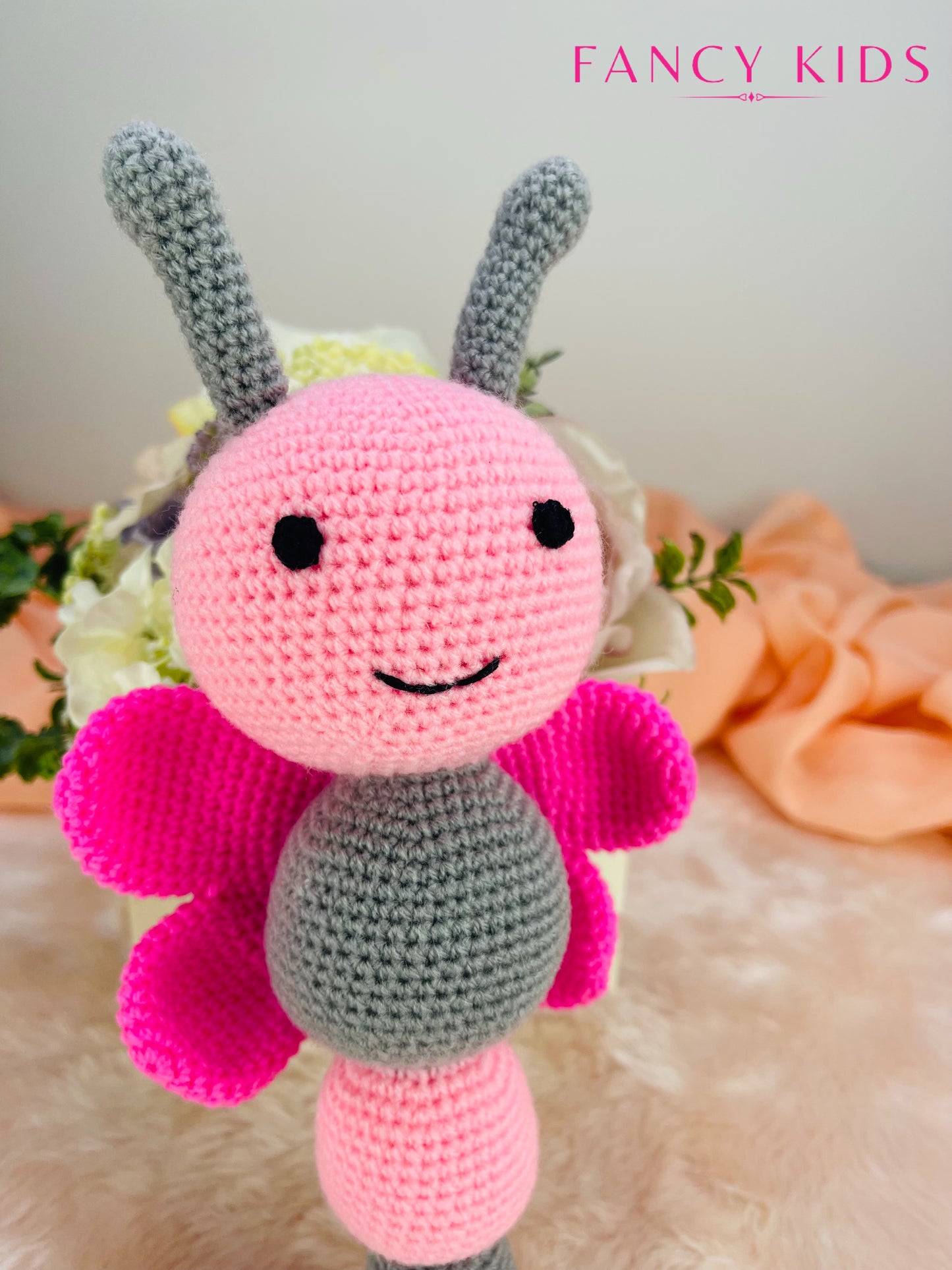 Pink butterfly- Hand knitted stuffed toy