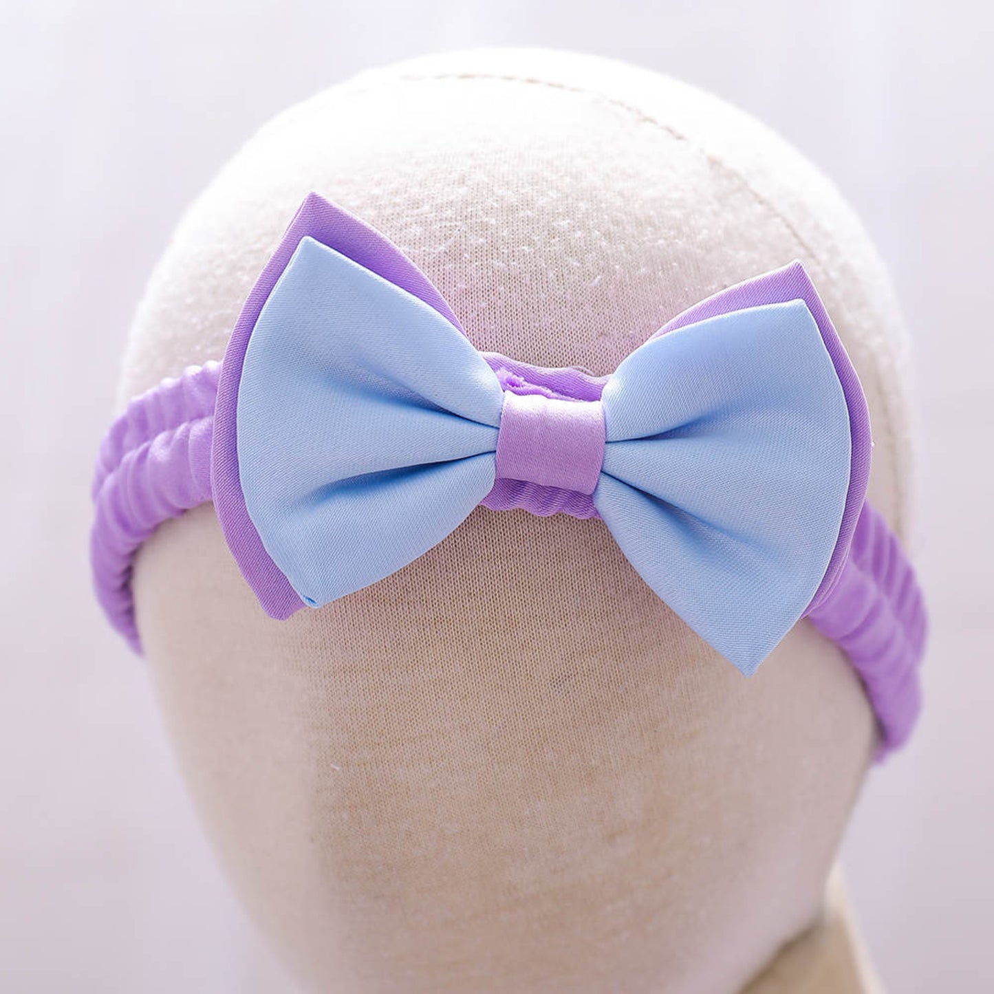 fancy bow blue and purple dress