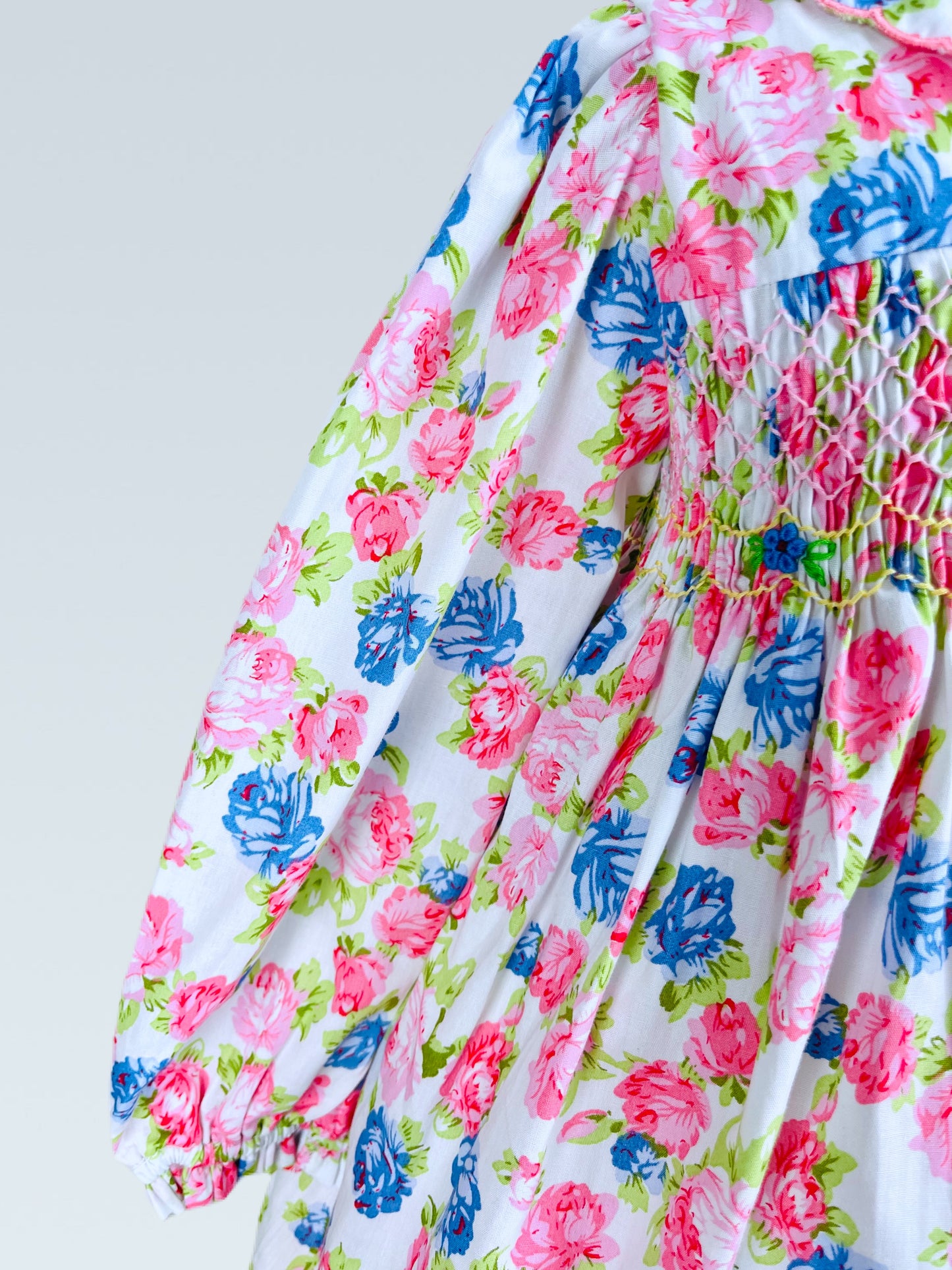 Victoria hand smocked long sleeve pink and blue floral dress