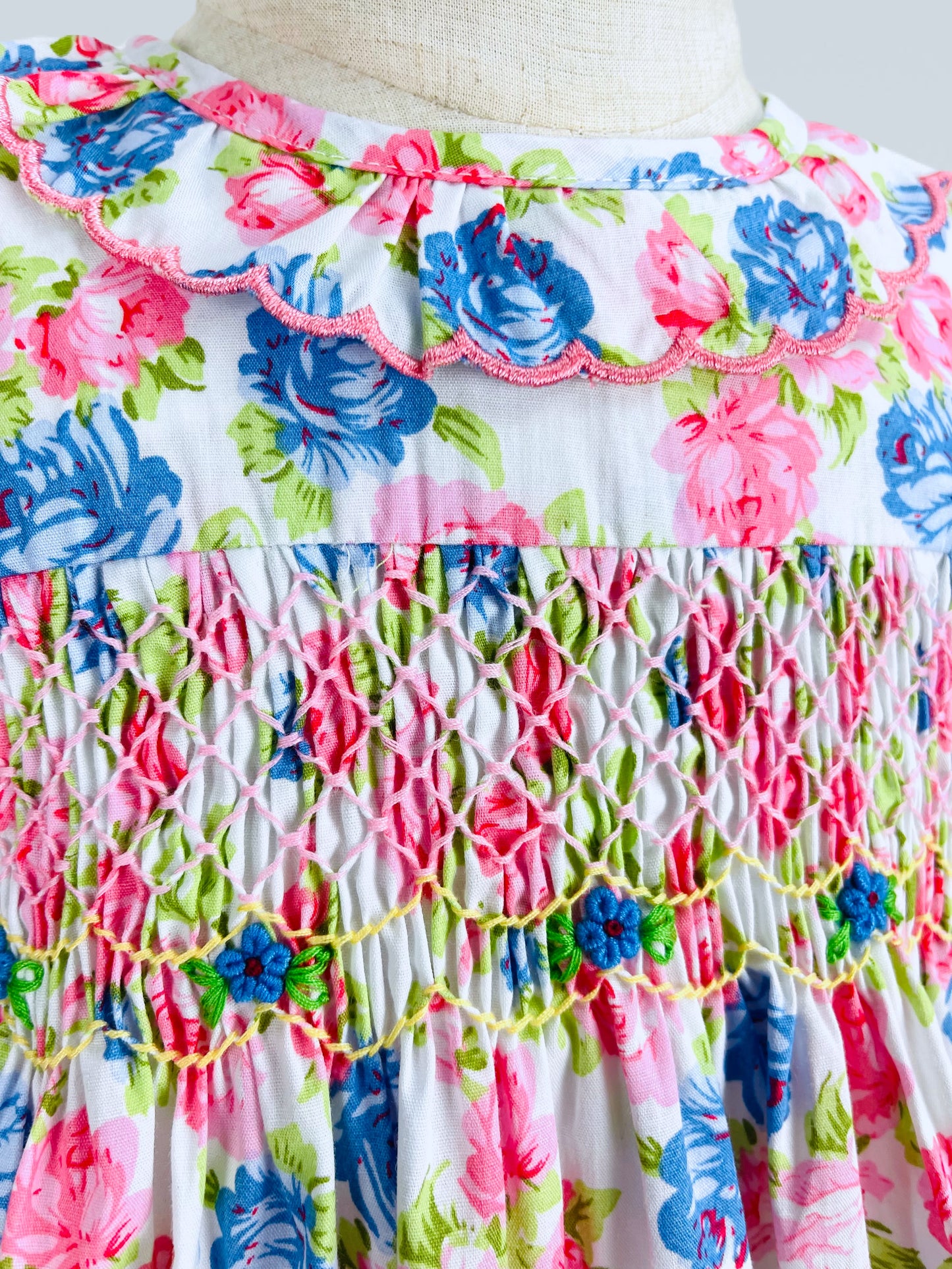 Victoria hand smocked long sleeve pink and blue floral dress