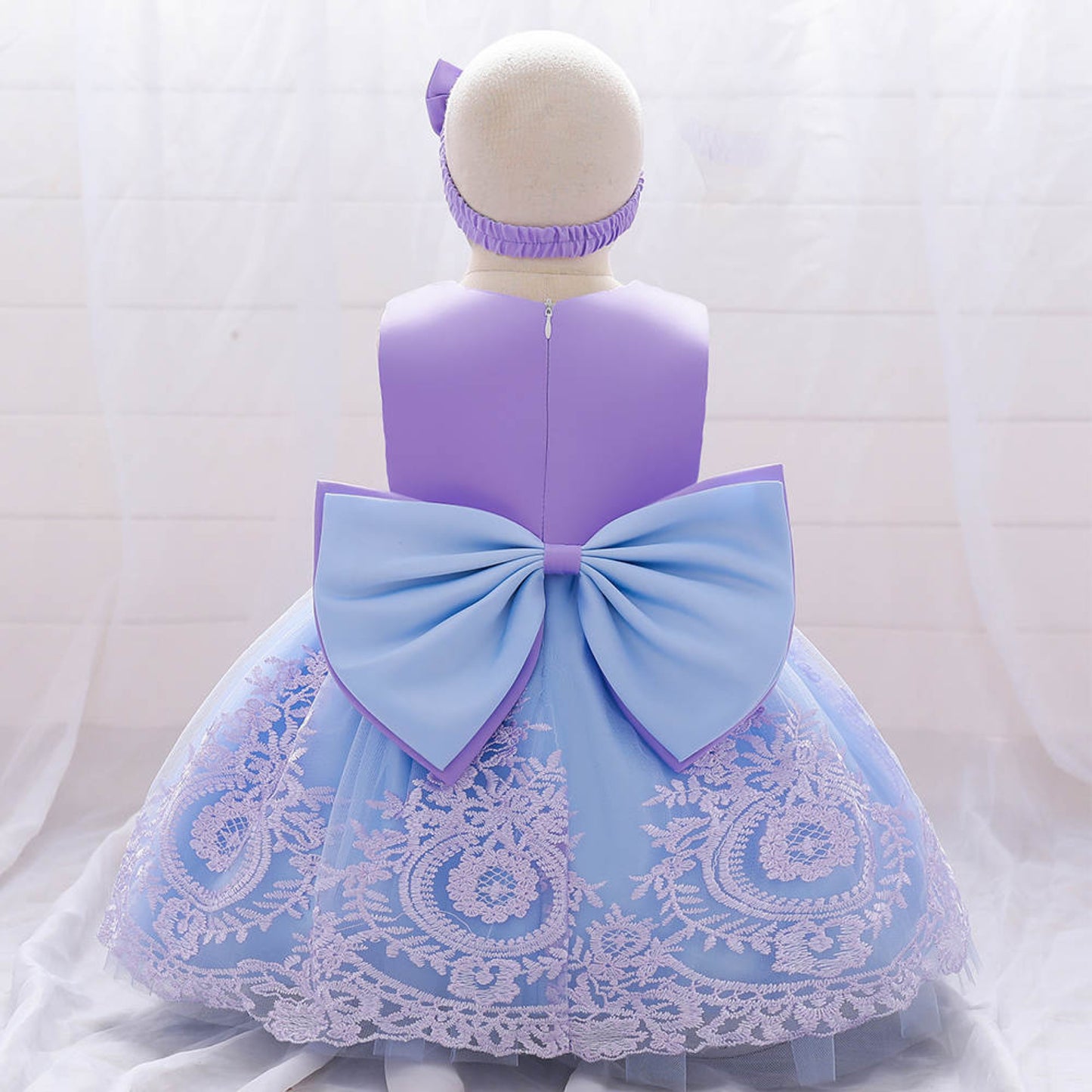 fancy bow blue and purple dress