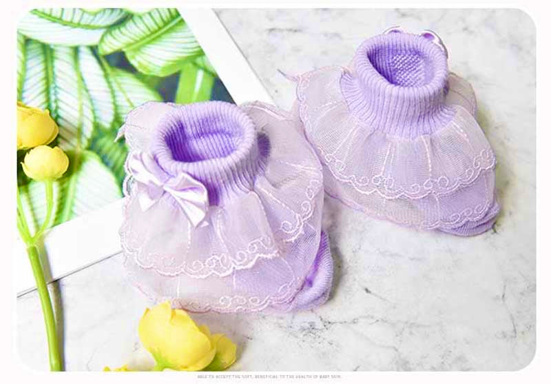 Socks with frills and a bow