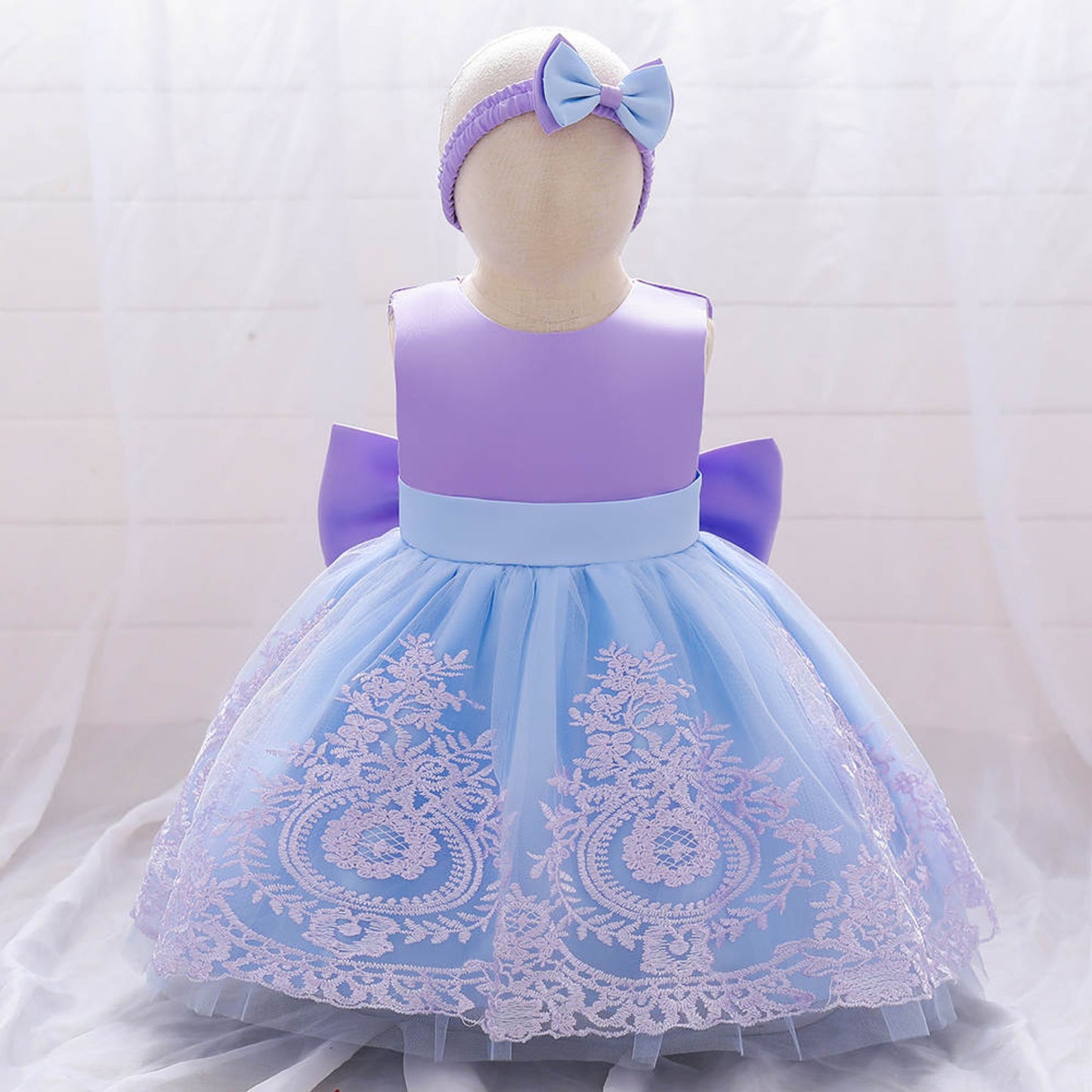 fancy bow blue and purple dress