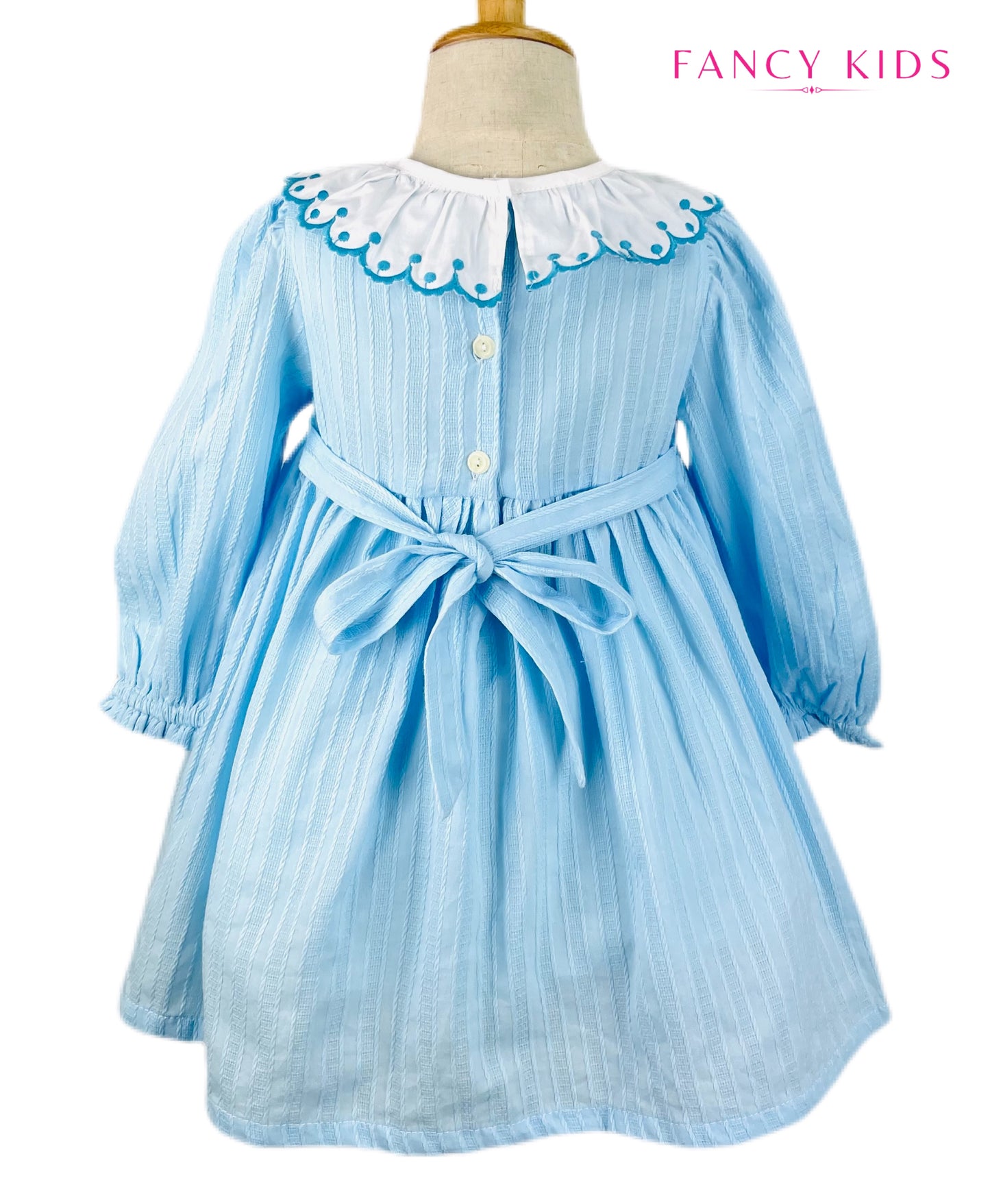 Arabella hand smocked Light blue long sleeve winter dress