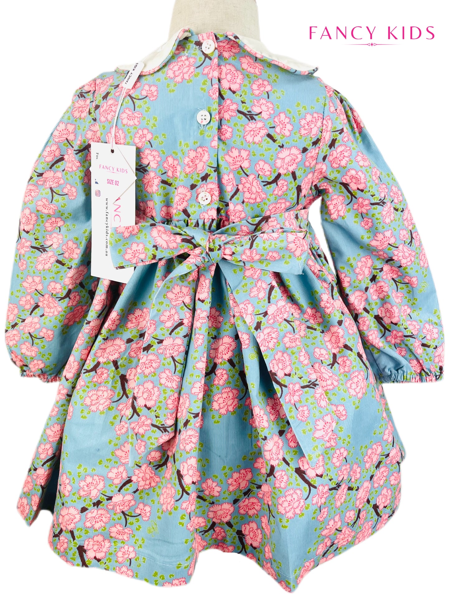 Jane hand smocked long sleeve pink and blue floral winter dress