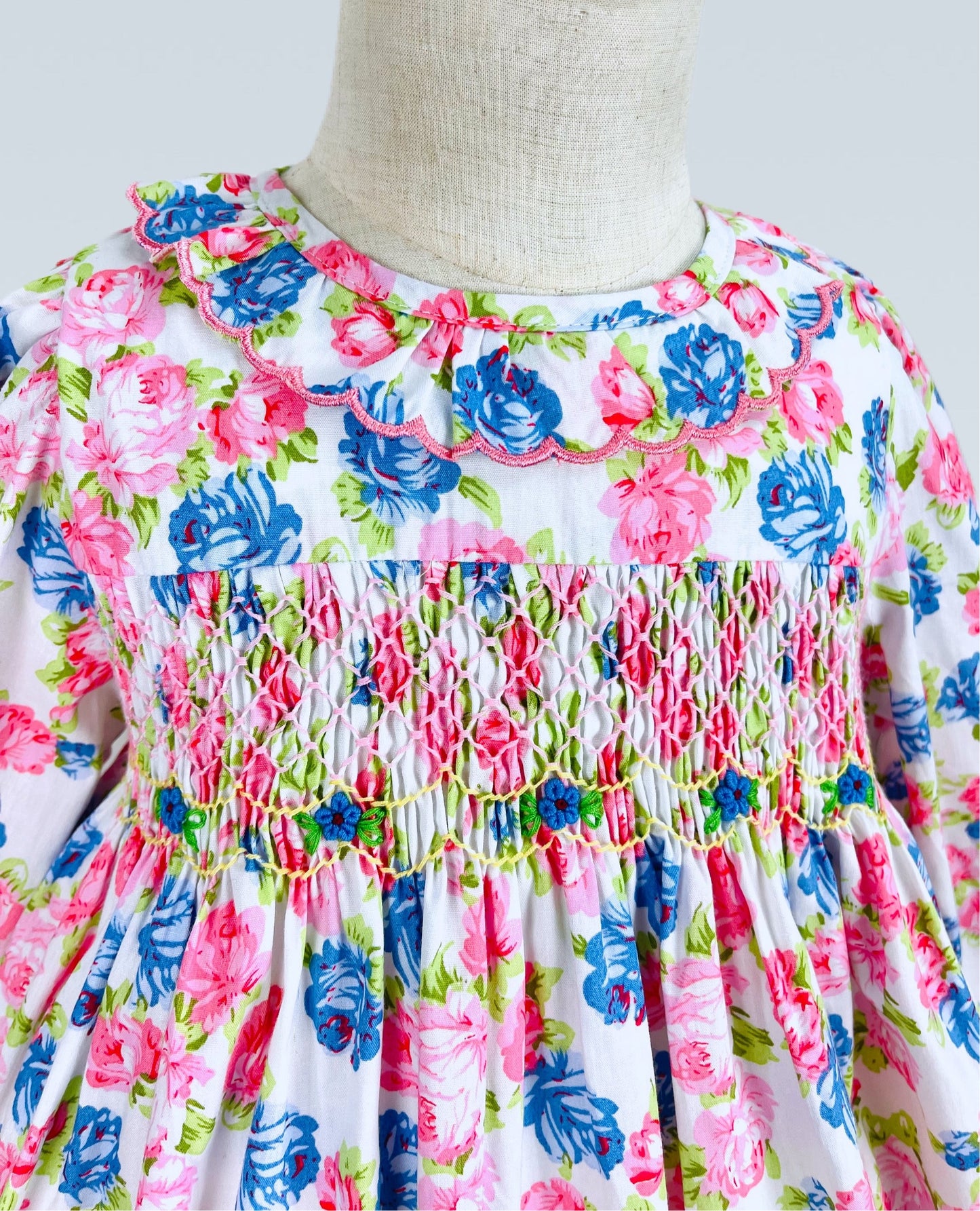 Victoria hand smocked long sleeve pink and blue floral dress