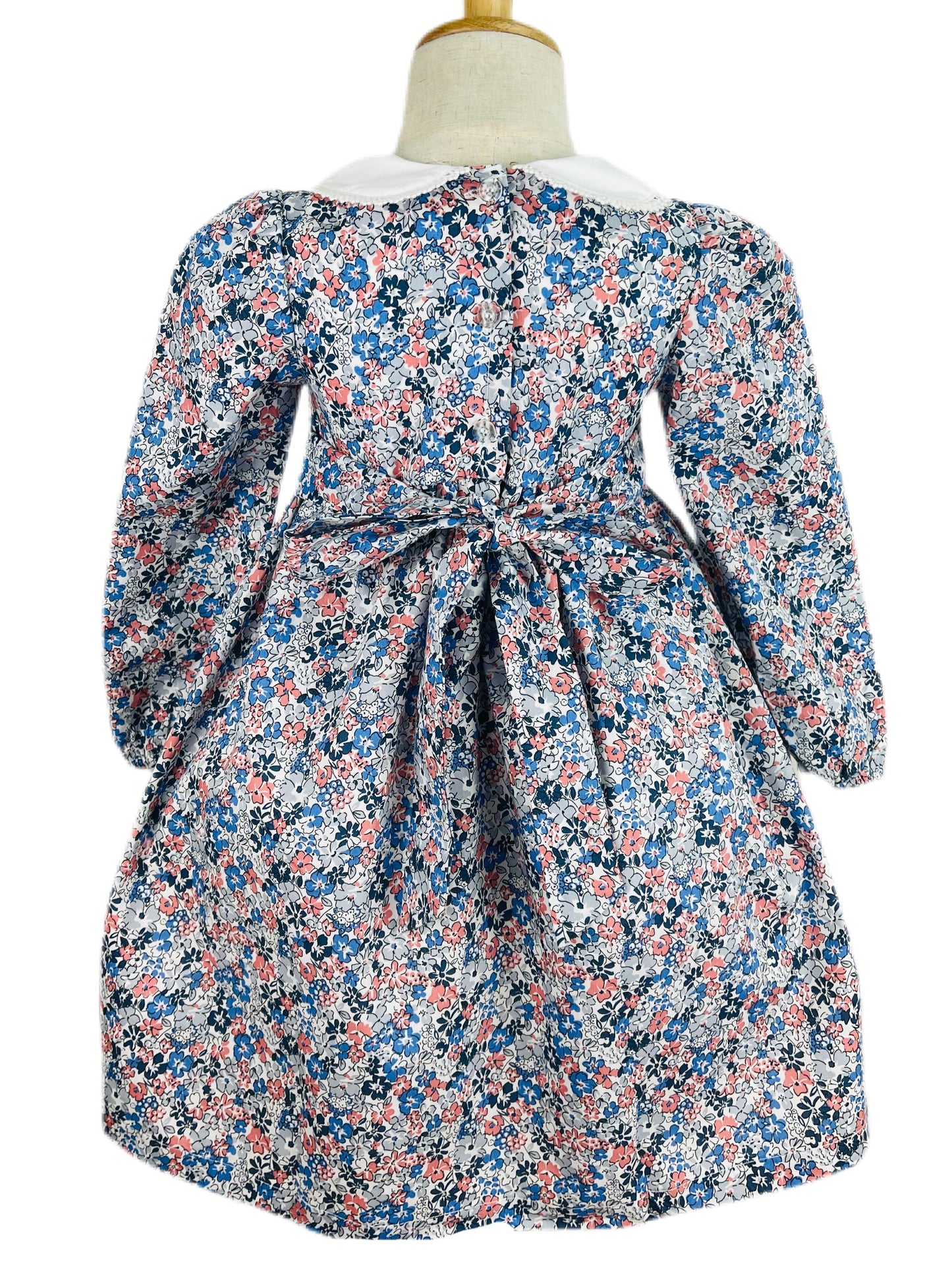 Milly hand smocked blue and pink floral long sleeve winter dress