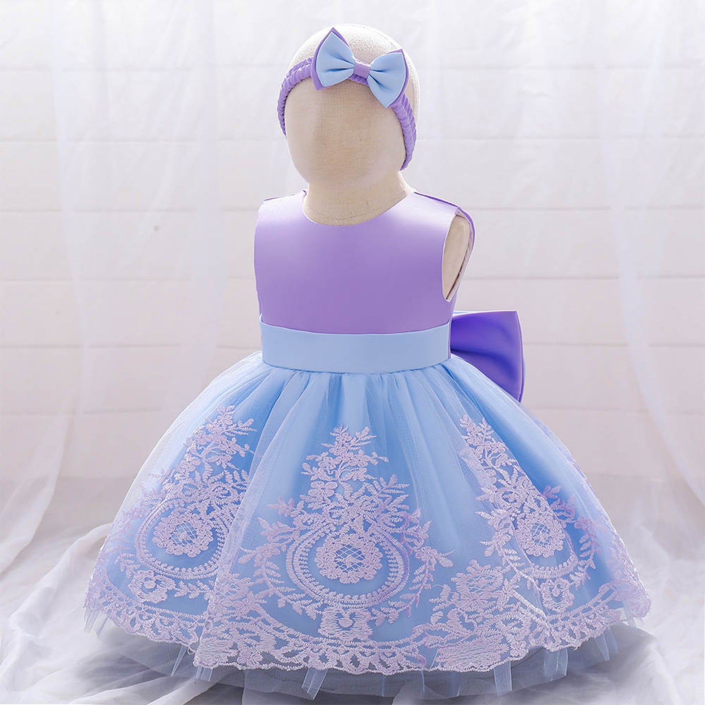 fancy bow blue and purple dress