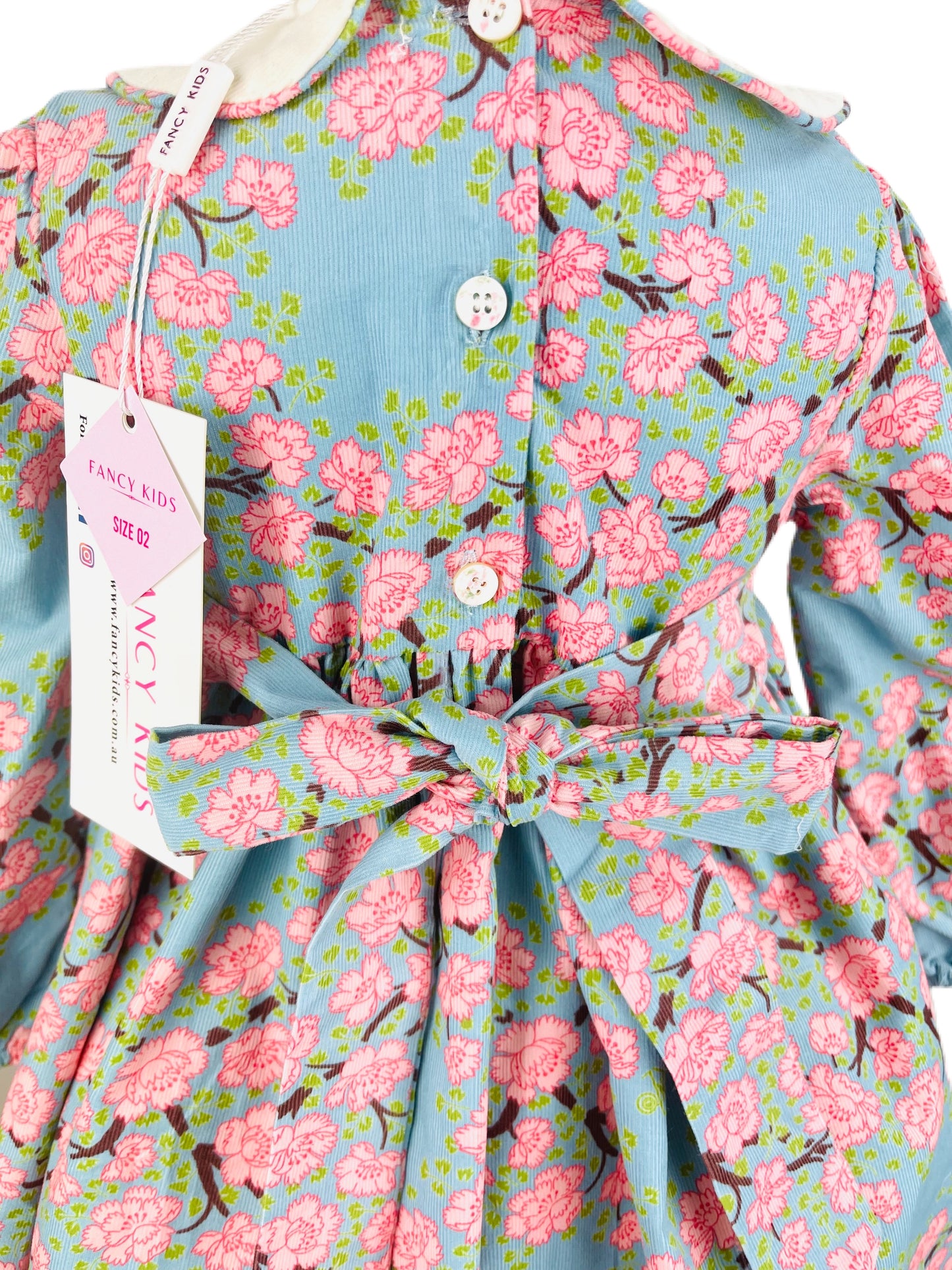 Jane hand smocked long sleeve pink and blue floral winter dress