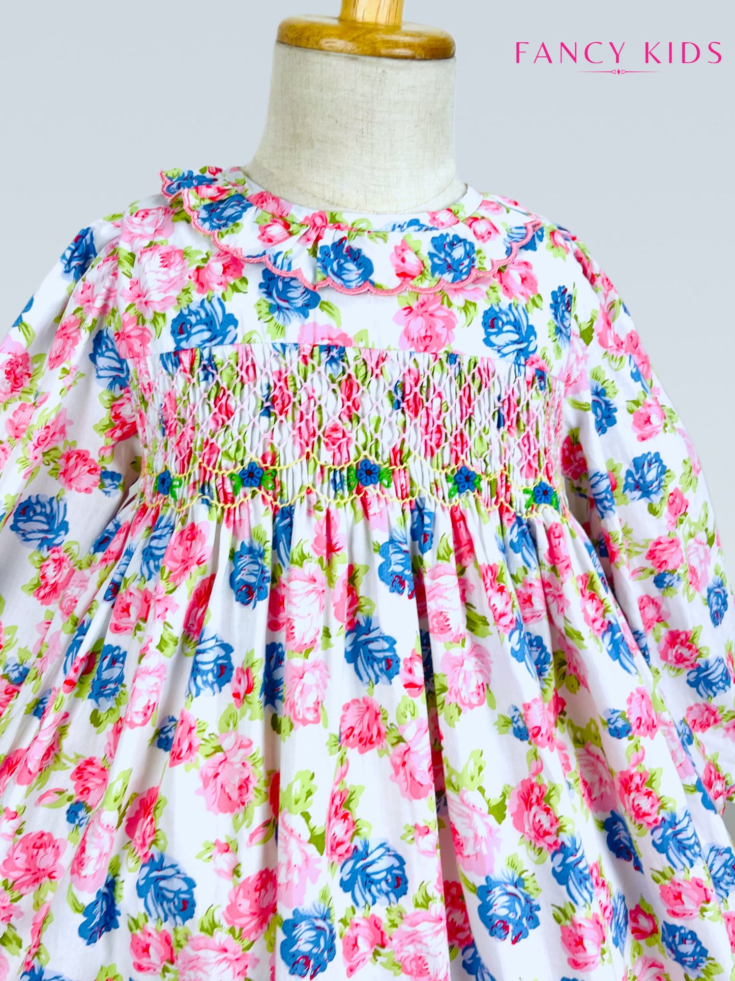 Victoria hand smocked long sleeve pink and blue floral dress