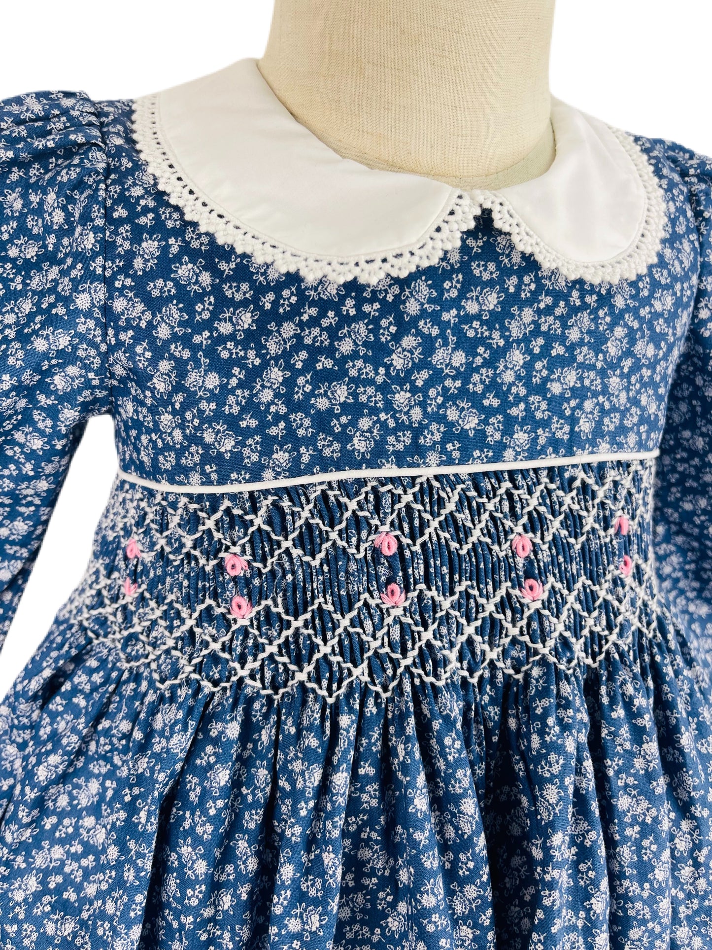 Maya hand smocked long sleeve blue floral winter dress